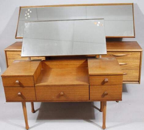 A Mackintosh style retro teak dressing table