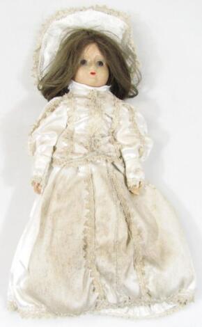 A late 19thC/early 20thC bisque headed doll