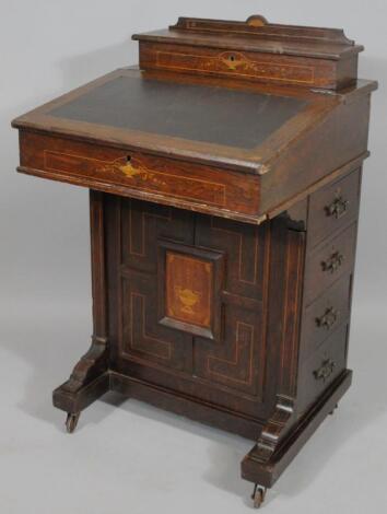 A Victorian rosewood Davenport desk