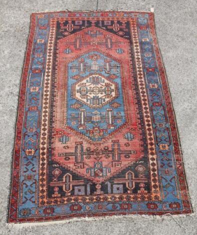 An early 20thC Persian woollen rug