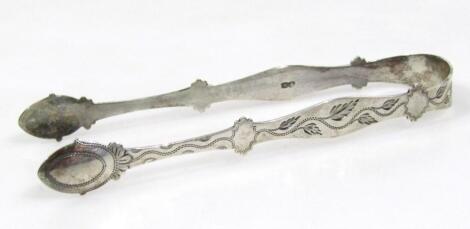 A pair of 19thC silver sugar bows