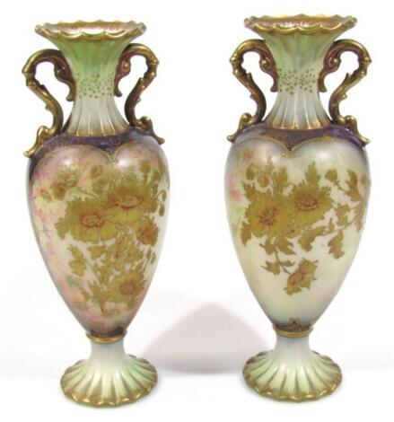 A pair of Edwardian Carltonware vases