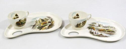 Two Clarice Cliff Royal Staffordshire transfer printed cups and sandwich plates