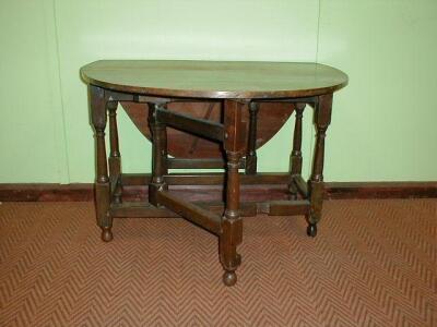 A 17thC and later oak gate leg dining table