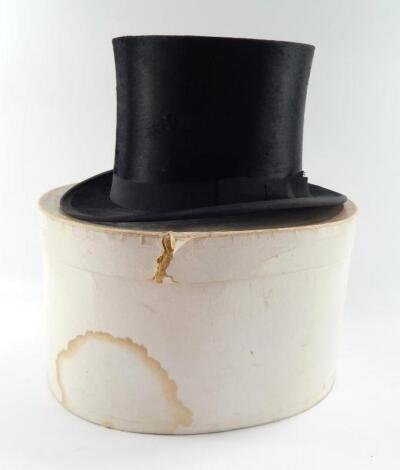 A McQueen & Co black top hat