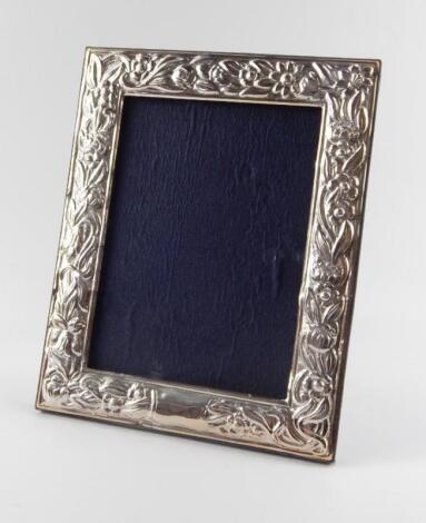 A strut photograph frame embossed with flowers