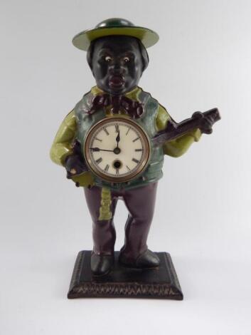 A black cast iron minstrel banjo player clock