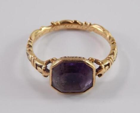 A George II amethyst and black enamel set mourning ring
