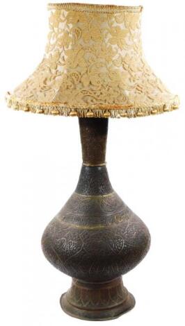 A Middle Eastern metal vase