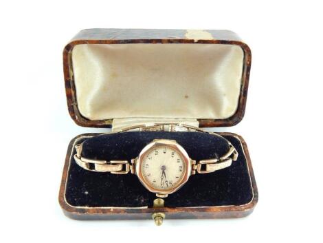 An Ovis lady's 9ct gold octagonal cased wristwatch