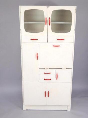 A Kompact white painted larder cupboard