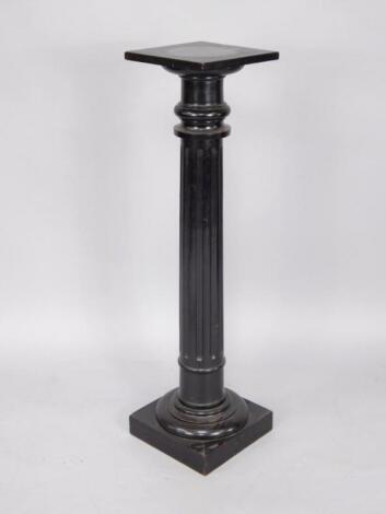 A Victorian ebonised jardiniere stand