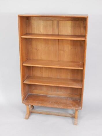 An Ercol elm bookcase