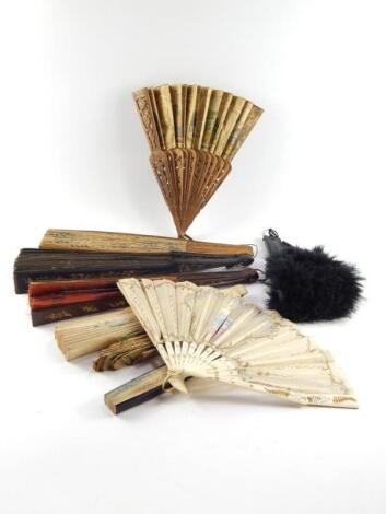 A Continental late 19thC wooden and paper brisee fan