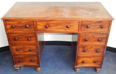 A Victorian mahogany twin pedestal desk