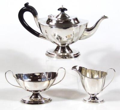 A George V silver three piece tea service