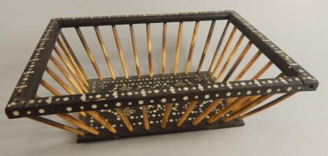 An early 19thC Anglo Indian ebony ivory and porcupine quill basket