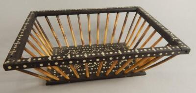 An early 19thC Anglo Indian ebony ivory and porcupine quill basket
