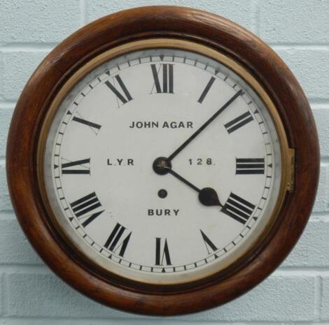 A late 19th/early 20thC oak railway wall clock