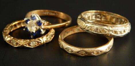 Four dress rings
