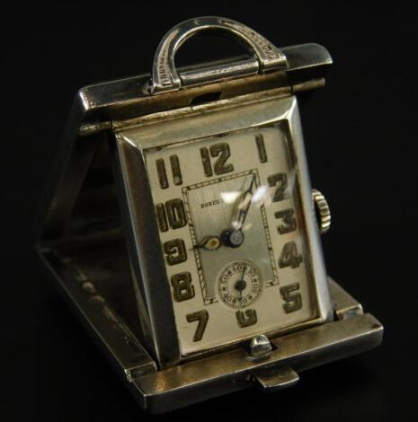 A Swiss miniature sterling silver travelling timepiece