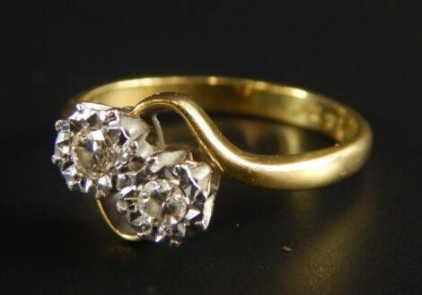 An 18ct gold diamond dress ring