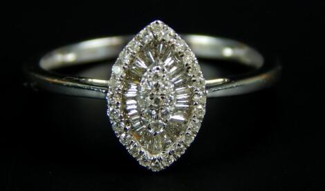 A marquise style diamond dress ring