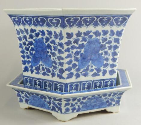 A Chinese blue and white porcelain hexagonal jardiniere and stand