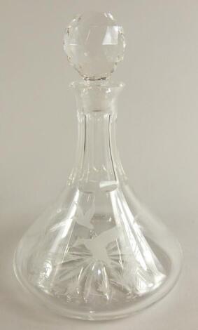 A ship's type cut glass decanter and stopper