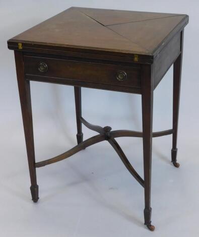 An Edwardian mahogany envelope card table