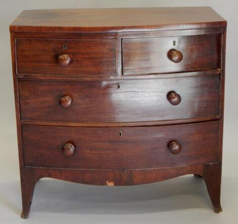 An early 19thC mahogany bow fronted chest of drawers