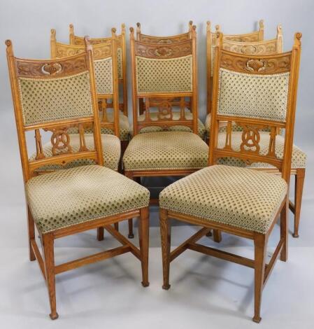 A set of eight Victorian oak dining chairs