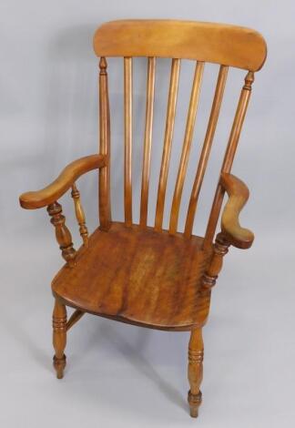 A 19thC lathe back open armchair