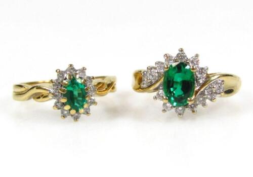 Two green stone and diamond gem rings. (2)