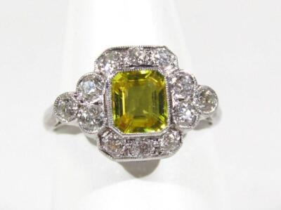 An Art Deco style yellow sapphire and diamond ring