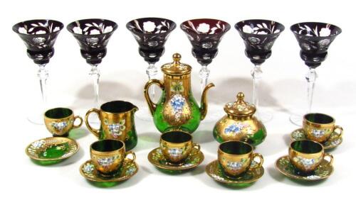 A Continental gilt green glass and porcelain drinks set