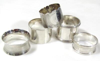 Four various silver napkin rings - 2