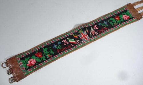 A 1919 leather and knitted Indian Poona (Pune) adjustable belt sash