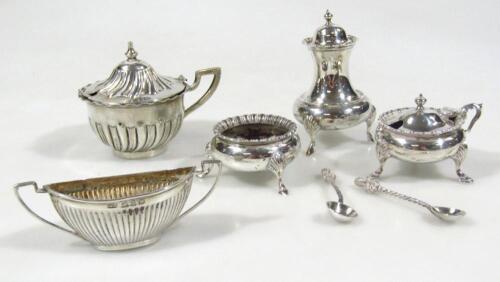 An Edwardian matched silver three piece cruet set