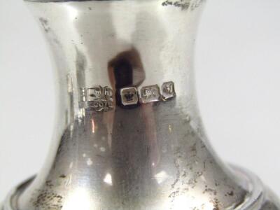 An Edwardian matched silver three piece cruet set - 9