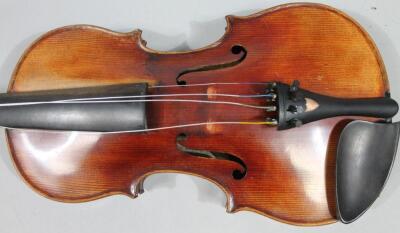 An early 20thC stained mahogany violin - 2