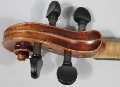 An early 20thC stained mahogany violin - 4