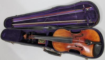 An early 20thC stained mahogany violin - 8