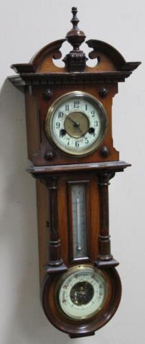 A late 19thC walnut cased barometer thermometer and clock