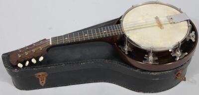An early 20thC wooden cased banjo