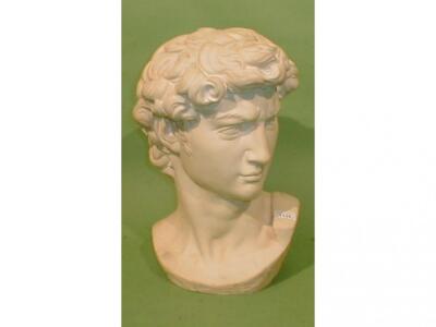 A carved marble bust of Michaelangelo's David