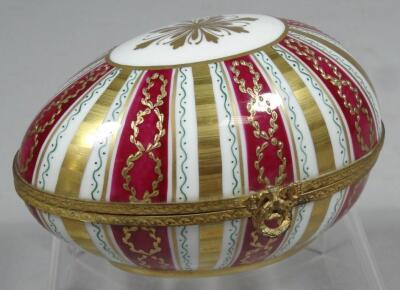 A 20thC La Tallec Parisian enamel style egg shaped casket