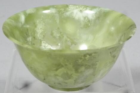 An olive jade coloured tea bowl