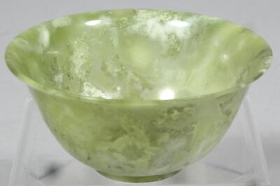 An olive jade coloured tea bowl