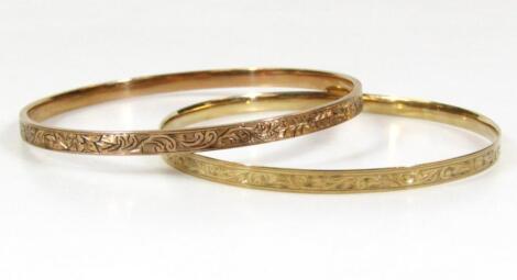 Two antique bangles.